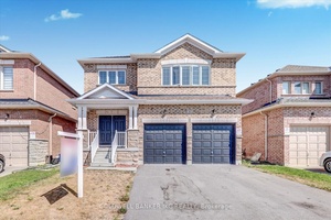 Stunning and spacious 2, 981 sq ft all brick and stone home featuring 4 bedrooms and 4 bathrooms.