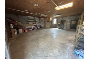 Ideally located at the end of a quiet street, this beautifully updated home sits on a generous 100 x 200 lot and is just minutes from downtown, the 401, and ...