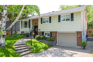 Welcome to this lovingly maintained raised bungalow, with over 3, 000 sq.