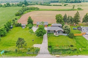 Located on the edge of town, this beautiful country home is just minutes away from the city.