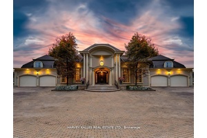 Welcome Home to 48 Wimpole Drive, a breathtaking, freshly renovated home nestled on a gated, estate sized lot in the prestigious St.