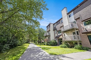 Bright, spacious, low maintenance 2 storey 2 Bedroom 2 Bathroom stacked condo apartment in the desirable Sawmill Creek community !