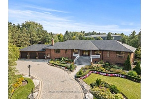 Welcome to 109 Collard Drive, a rare opportunity to own a custom raised bungalow on over 2 acres of meticulously landscaped grounds with more than 400 feet of frontage in ...