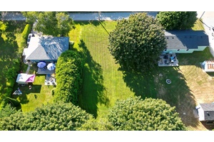 Tucked away on a quiet, tree lined lane in the heart of charming and historic Southampton, this 50.