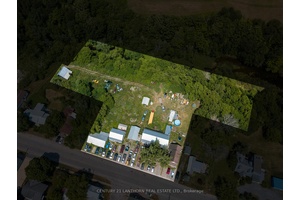 This 2. 6 acre property has commercial zoning and is right by the heart of Milford.