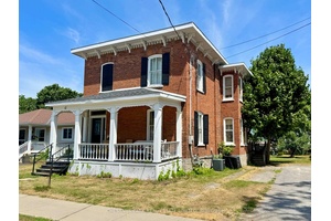 Welcome to this charming 2 storey brick century home nestled in the heart of Picton, Prince Edward County.