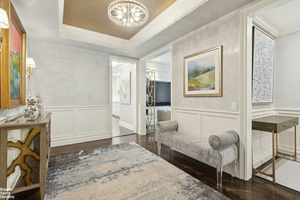 Mint Park Avenue Renovation This meticulously renovated and exquisitely decorated eight into seven room apartment is a blend of timeless architectural charm and modern sophistication.