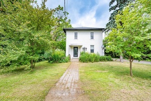 Welcome to one of the largest residential lots in town, sitting on an impressive 0.