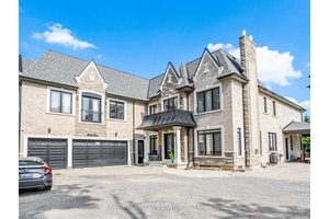 Step into luxury in this executive residence featuring a grand open concept layout and impeccable designer finishes throughout.