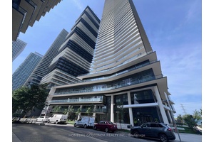 brand new, stylish waterfront condo a rare corner unit with breathtaking North East lake and city views !