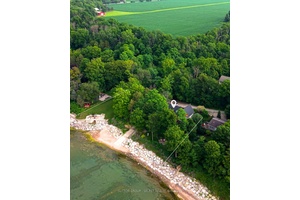 A RARE OPPORTUNITY TO OWN ONE OF THE MOST PRIVATELY OWNED BEACHFRONT PROPERTIES IN LAMBTON SHORES WITH 222 FT OF BEACHFRONT and a 1 acre estate sized lot on a ...