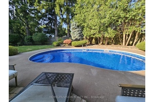Welcome to Resort Style Cul de Sac LivingNestled on a private pieshaped lot in Sheridans exclusive Mississauga Golf amp ; Country Club enclave, this 5 1bed, 4bath estate radiates luxury ...