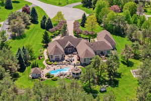 Rare 3923sf Elegant Tuscan Styled Bungalow Estate on a 2.