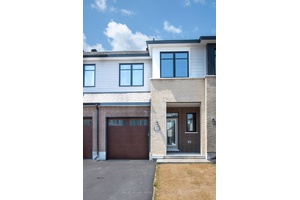 Welcome to The Abbey model townhome, offering 1, 855 sqft of finished living space.