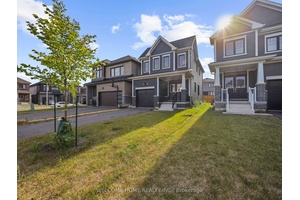 3 bedroom, 3 washroom, Open concept Main floor with White Kitchen, Stainless Steel Appliances, Light Hardwood Flooring, 9Ft Ceilings, Extra Wide staircase, Upgraded doors through out the house.