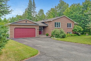 Discover the perfect blend of comfort and natural beauty in this architecturally designed 2 1 bedroom 2 bath split level.