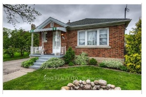 Charming all brick bungalow with bright main Floor.