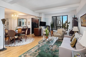 You can have it all in this lovely and spacious Art Deco two bedroom, two bath home !