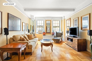 Welcome home to this outstanding 2 bedroom, 2 bath pre war residence which exudes warmth and sophistication throughout.