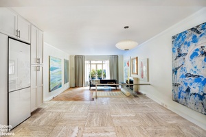 Enjoy loft like living in this unique Central Park South one bedroom residence with new kitchen, elegant entry foyer and a home office.