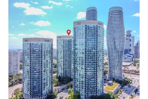 Welcome to 1206 at 70 Absolute Ave, a sun drenched 2 bedroom den, 2 bath corner suite in the heart of Mississauga.