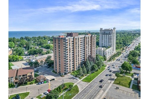 Check out this amazing 2 Bedroom south facing suite within walking distance to the beach, Across from the GO Train, Marie Curtis Park, Golf, Shops, restaurants and so much more ...