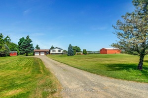 Welcome to this one owner, custom built raised brick bungalow, offering over 1, 650 sq.