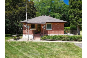 Tucked away on a quiet street in the heart of Ingersoll, this rare opportunity features two homes on a spacious 0.