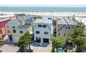 Step into coastal luxury with this impeccably updated 6 bedroom, 4 full bath, direct oceanfront home.