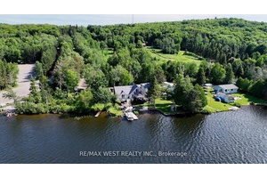 Beautiful waterfront home in the charming village of Astorville, just 20 minutes south of North Bay, offering approximately 7.