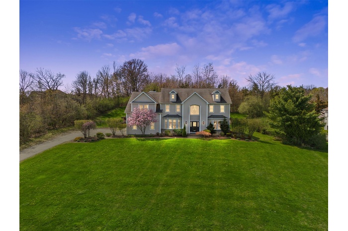 Traditional-style home with a yard