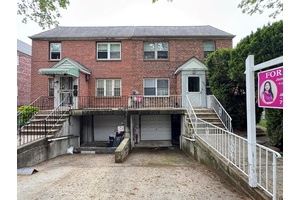 Semi detached 2 family brick in Fresh Meadow.