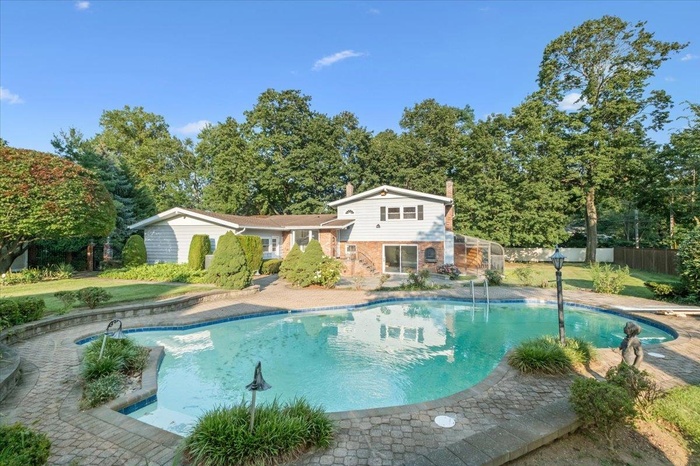 Gorgeously Manicured Private 1/2 acre with Inground Pool