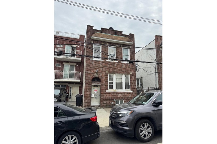 View of front of property with brick siding