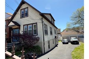 Beautifully Renovated 2 Family Detached Home in Prime Country Club Location Welcome to this stunningly renovated 2 family detached home located in the highly sought after Country Club neighborhood.