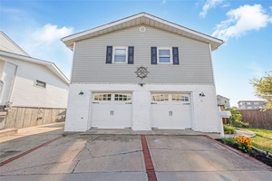 Stunning High Ranch on the Canal Just 3 Houses from the Open Bay !