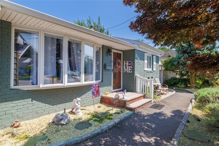View of front of home with brick siding
