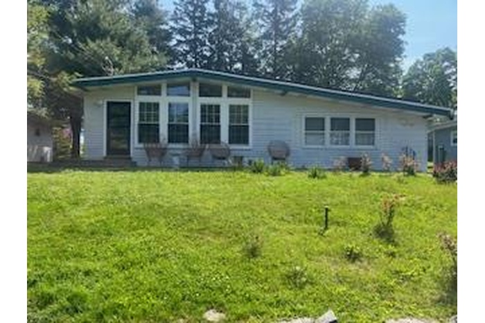 View of front of home with a front yard