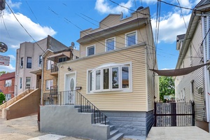 Magnificent 2 Family free standing 2 Story masterpiece, having a full basement and plenty of parking space.