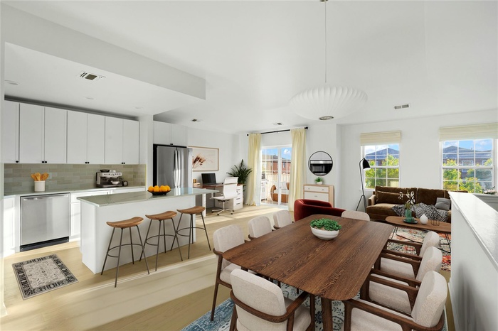 Dining room featuring light wood-type flooring