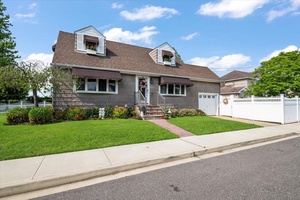 This well maintained expanded Cape offers 3 spacious bedrooms and 2 full bathrooms across a functional layout.
