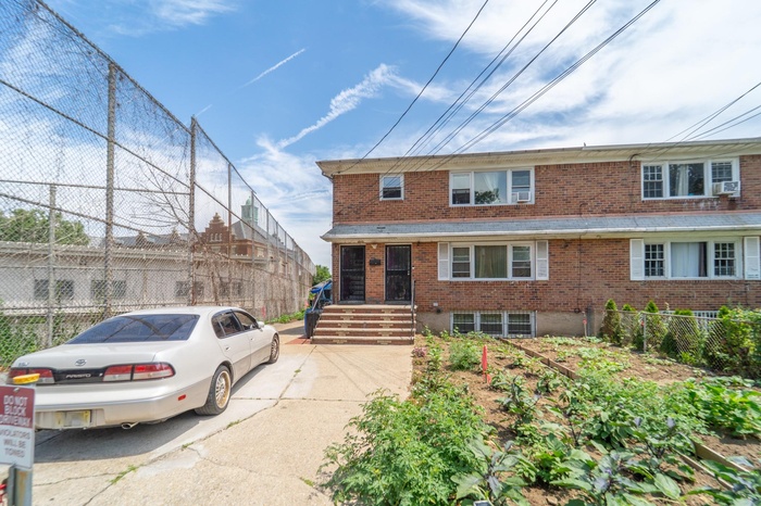 Traditional-style house featuring brick siding