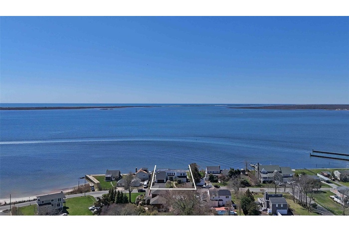 Water view featuring nearby suburban area
