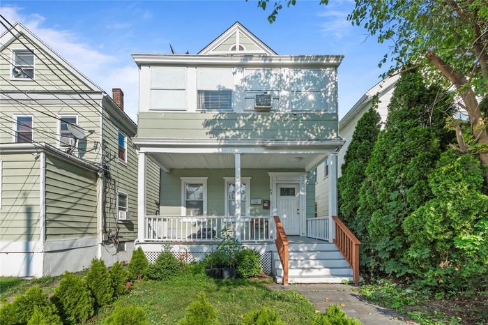 View of front of property with a porch