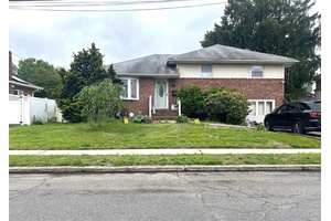 Split Level Home. This Home Features 4 Bedrooms, 2.
