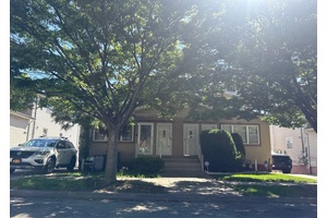 Colonial Style Home. This Multi Family Home Features 5 Bedrooms, 2 Full Baths, Formal Dining Room amp ; Eat In Kitchen.