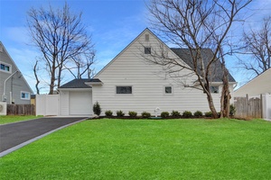 Move right into this renovated, 4 bedroom, 2 bathroom, Expanded, Levitt Ranch Style home, in Wantagh.