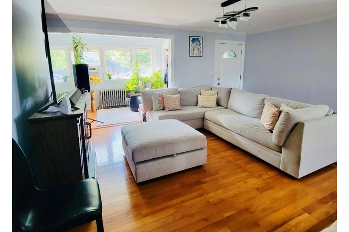 Living room with sun room/den