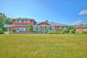 Spacious 1. 5 Storey Home on Nearly 5 Acres with In Law Suite amp ; Indoor Pool.