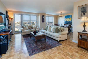 Welcome to this beautifully renovated 2 bed 2 bath corner apartment, offering a unique blend of style, comfort and convenience.
